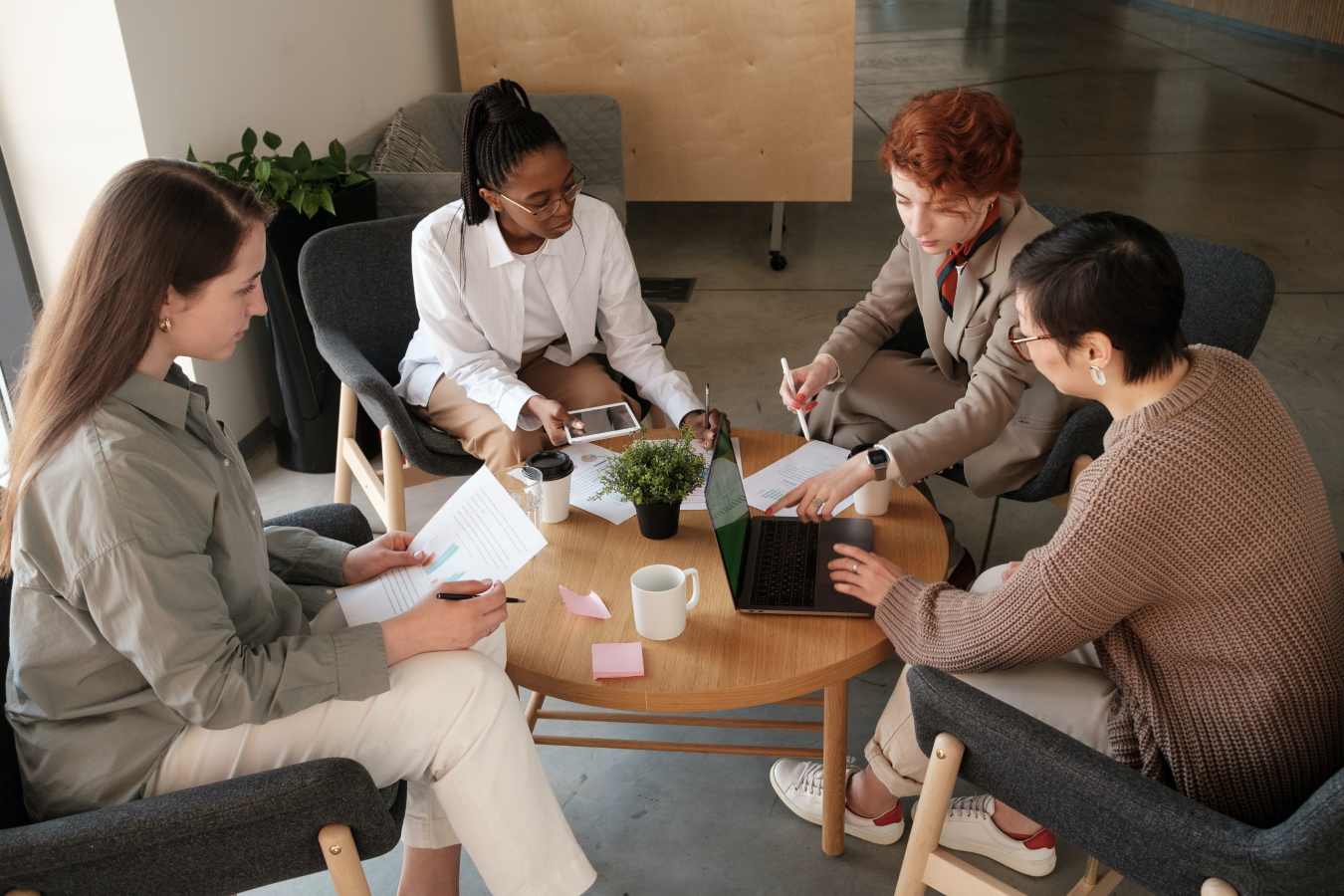 team meetings in office a ,a trainer training the employee